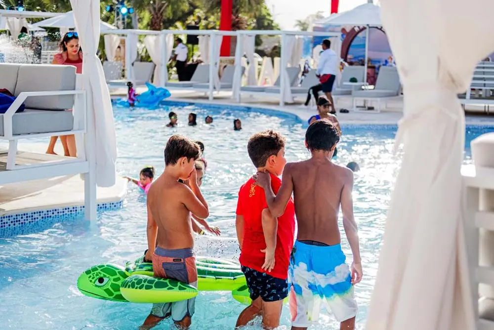 Boys at the Monkey Club pool in Playa Palmera